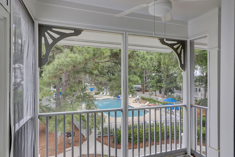 Screened porch overlooking the pool